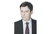 Mecenas Aleksander Stawicki.